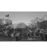 a black and white photo of a crowd of people